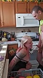 Husband sneaks in on wife doing dishes snapshot 8