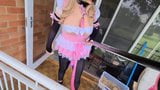 Pink Goth Maid in chastity riding a dildo on public balcony snapshot 8
