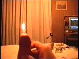 Burning candle in peehole snapshot 4