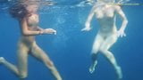 2 Hot Girls naked in the sea swimming snapshot 3