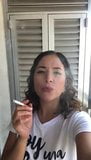 me, Marcela smoking cigarette2 snapshot 2