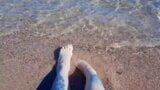 Dominatrix Nika enjoys the salty sea on her feet. snapshot 1