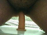 Riding big dildo snapshot 2