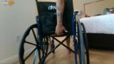 Handicapped guy wheels around hotel room naked in wheelchair snapshot 4