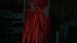 Crossdressing in red satin long gown snapshot 14