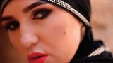 Arab very hot girl in a hijab smoking snapshot 5