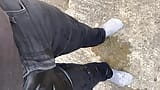 Pissing my black jeans outside snapshot 6