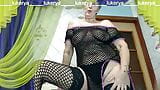 Lukerya crocheted an erotic fishnet dress and stockings and flirts with fans on a webcam, exciting and captivating their snapshot 20