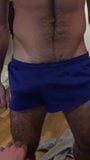 bulge under his sports short snapshot 1