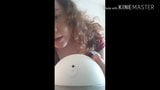 Curly girl shows how to pump breast milk on Youtube snapshot 11