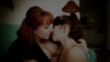 Redhead MILF shows young babe how to finger and lick pussy snapshot 1