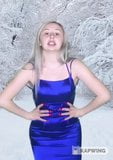 Blonde youtuber in glossy satin prom dress snapshot 8