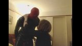 Rose gives Latex Man a Blowjob snapshot 11