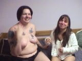 Chunky tattooed chick sits on a midget girl's face in her bedroom snapshot 2