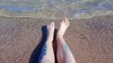 Dominatrix Nika enjoys the salty sea on her feet. snapshot 6