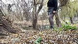 Curvy MILF in a skirt that barely covers her ass pisses on the river bank snapshot 1