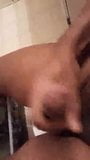 Busting a small nut in bathroom on stomach snapshot 3