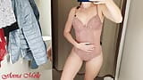 The girl loves trying on different underwear and filming it on camera snapshot 15