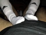 Teasing socked footjob snapshot 2