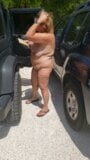 Bbw chubby milf is nude outside. Getting ready for a naked day at the nudist resort. snapshot 2