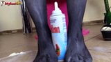 Brunette in pantyhose gives footjob to a cream tube snapshot 15