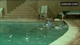 S. Grandi in white panties swimming with a guy in a 1987 movie snapshot 9