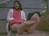 Asian woman showing her feet snapshot 11