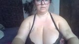 MILF in glasses with huge natural tits showing snapshot 2