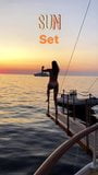 Alessandra Ambrosio jumping into the water at sunset snapshot 4