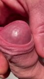 Edging his big cock head with his own foreskin until he cums snapshot 6