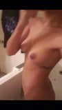 Girl Getting Naked in the Shower snapshot 2