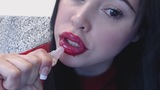 Brunette with red glossy lips snapshot 17