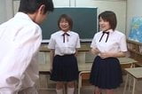 Two Japanese school girl spitting on teacher snapshot 2