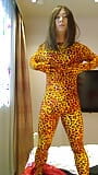 Amateur crossdresses wearing pink and leopard morphsuit masturbate snapshot 9