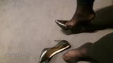 Putting on some black Buffalo leather heels snapshot 6