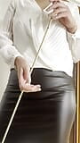 PART 2 POV Strict teacher in leather skirt, pantyhose and high heels educates her student with the cane snapshot 19