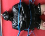 Straitjacketed slave is restrained to the Frame snapshot 9