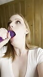 Blonde slut RoseThorneQOS deepthroats huge purple dildo snapshot 1