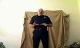 Mustache cop striptease snapshot 3