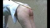 schoolgirl caned outdoors snapshot 15