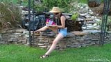 A girl, posing on a beautiful fountain background snapshot 2