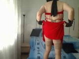 Milf trans lady en vestido rojo y tacones rojos habla con voz sexy y se toca snapshot 2