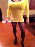 Busty cross dresser in yellow smoking snapshot 3