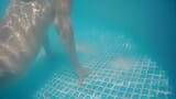 Swimming around naked in a garden pool with teasing snapshot 12