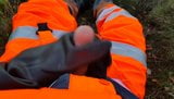 Worker in hiviz rain gear and rubber boots snapshot 8