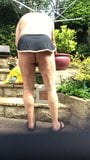 gardening in g string shorts snapshot 3