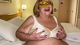 Blonde grandma takes off her bra so you can suck her fat and drooping tits snapshot 2