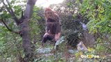 Redheaded Babe Pisses Long And Hard In Trees snapshot 5