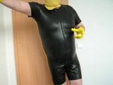 in my tight rubber short suit showing my fat man tits snapshot 3