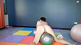 Nude Yoga. Regina Noir. A woman in yoga leotards practices yoga the gym. C1 snapshot 16